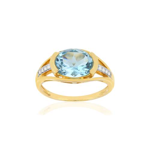 Bague or 375 2 tons, topaze bleue traitée, diamants.