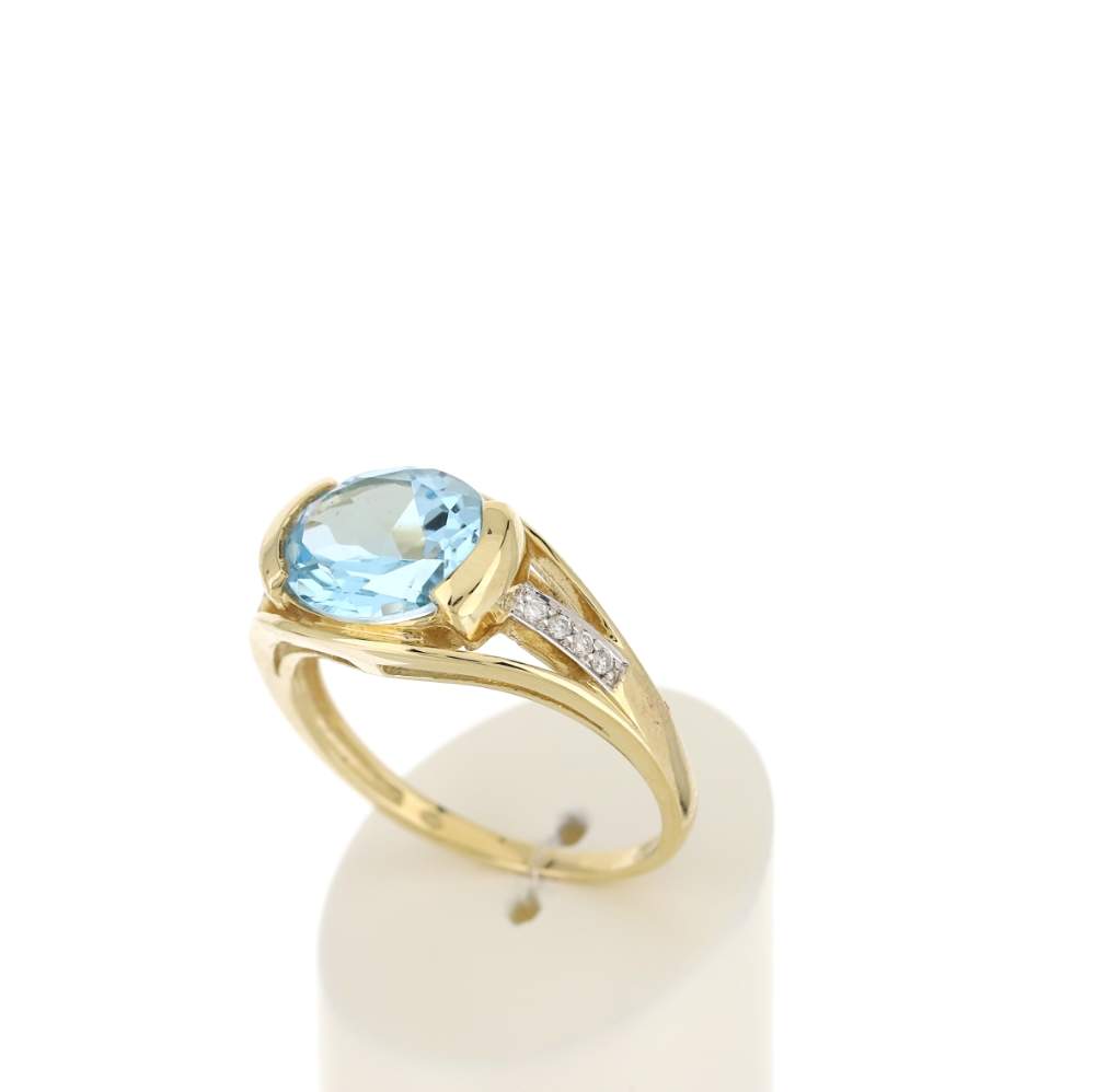 Bague or 375 2 tons, topaze bleue traitée, diamants. - vue 3