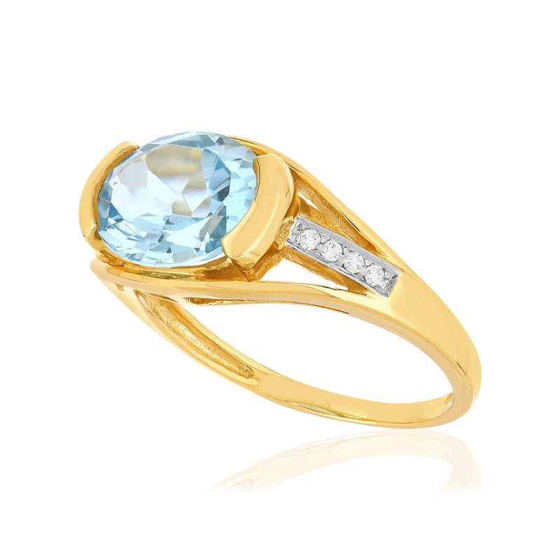 Bague or 375 2 tons, topaze bleue traitée, diamants. - vue D1