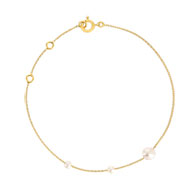 Bracelet or jaune 375, 3 perles de culture de Chine. Longueur 18 cm.
