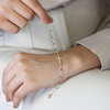 Bracelet plaqué or croix zirconias - vue Vporté 1
