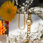 Montre femme dorée jaune - vue D1