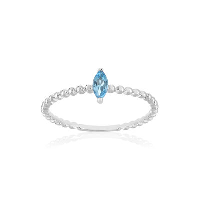 Bague or 375 blanc topazes bleue traitée