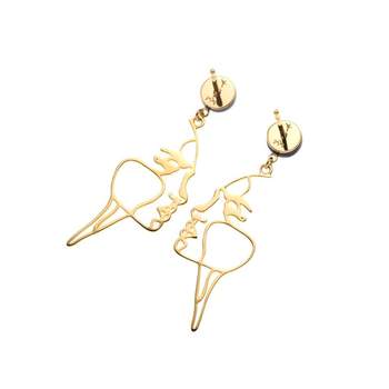 Earrings, yellow gold 375 mother-of-pearl, face motif