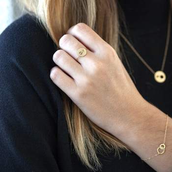 Bague or jaune 750 motif disque