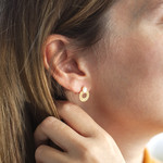 Gold-plated mother-of-pearl earrings with beaded hoop motif - view worn 1