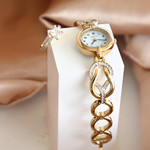 Montre femme métal doré et strass - vue D1