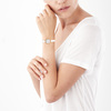 Montre femme dorée rose bracelet cuir blanc - vue Vporté 1