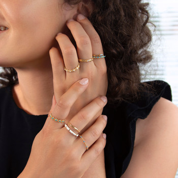 Bague plaqué or jaune perlée motif soleil et résine bleue