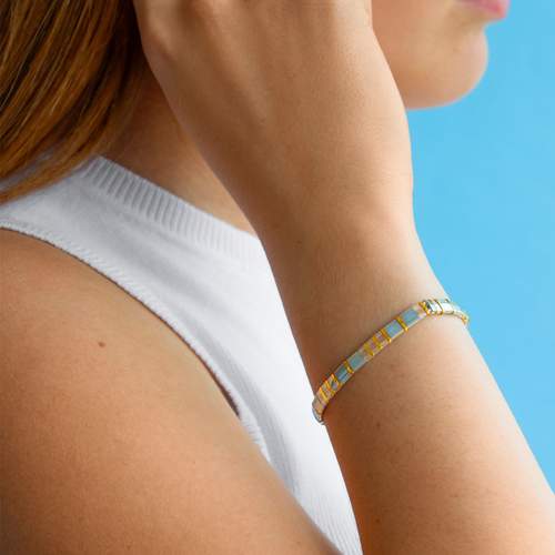 Bracelet élastique perles japonaises MIYUKI en verre émaillé ton gris et blanc