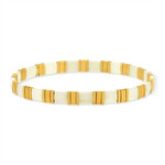 Bracelet élastique perles japonaises MIYUKI en verre émaillé ton blanc et doré - vue porté 1