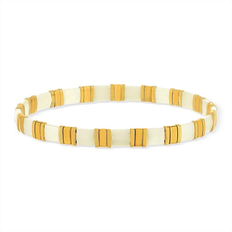 Bracelet élastique perles japonaises MIYUKI en verre émaillé ton blanc et doré - vue porté 1