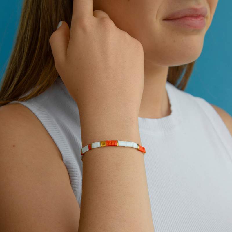 Bracelet élastiques perles japonaises MIYUKI en verre émaillé ton orange blanc et doré - vue 1