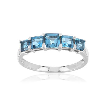 Bague or 375 blanc topazes bleues traitées