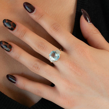 Bague or 375 2 tons topaze traitée et zirconias