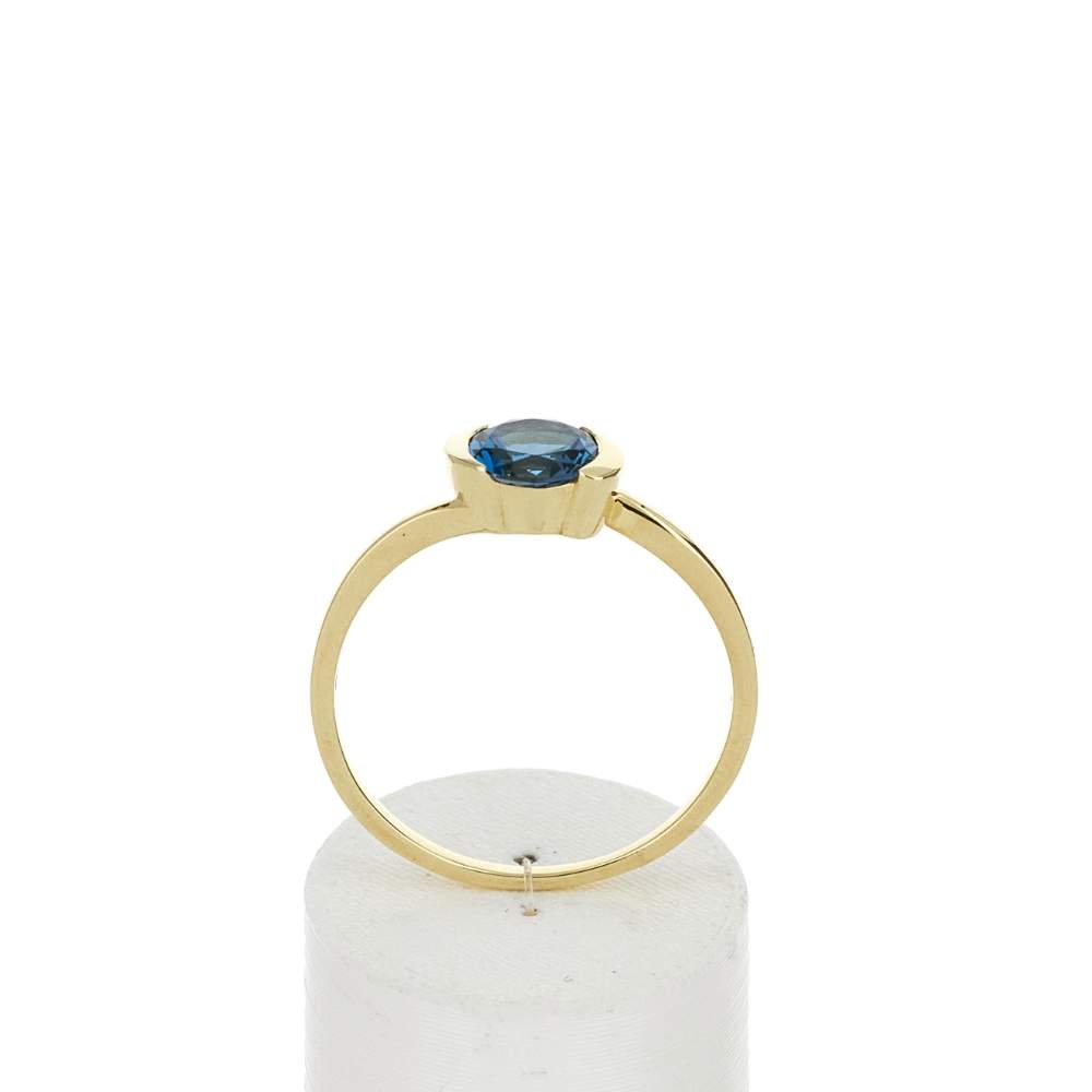 Bague or 375 jaune topaze bleue traitée - vue 1