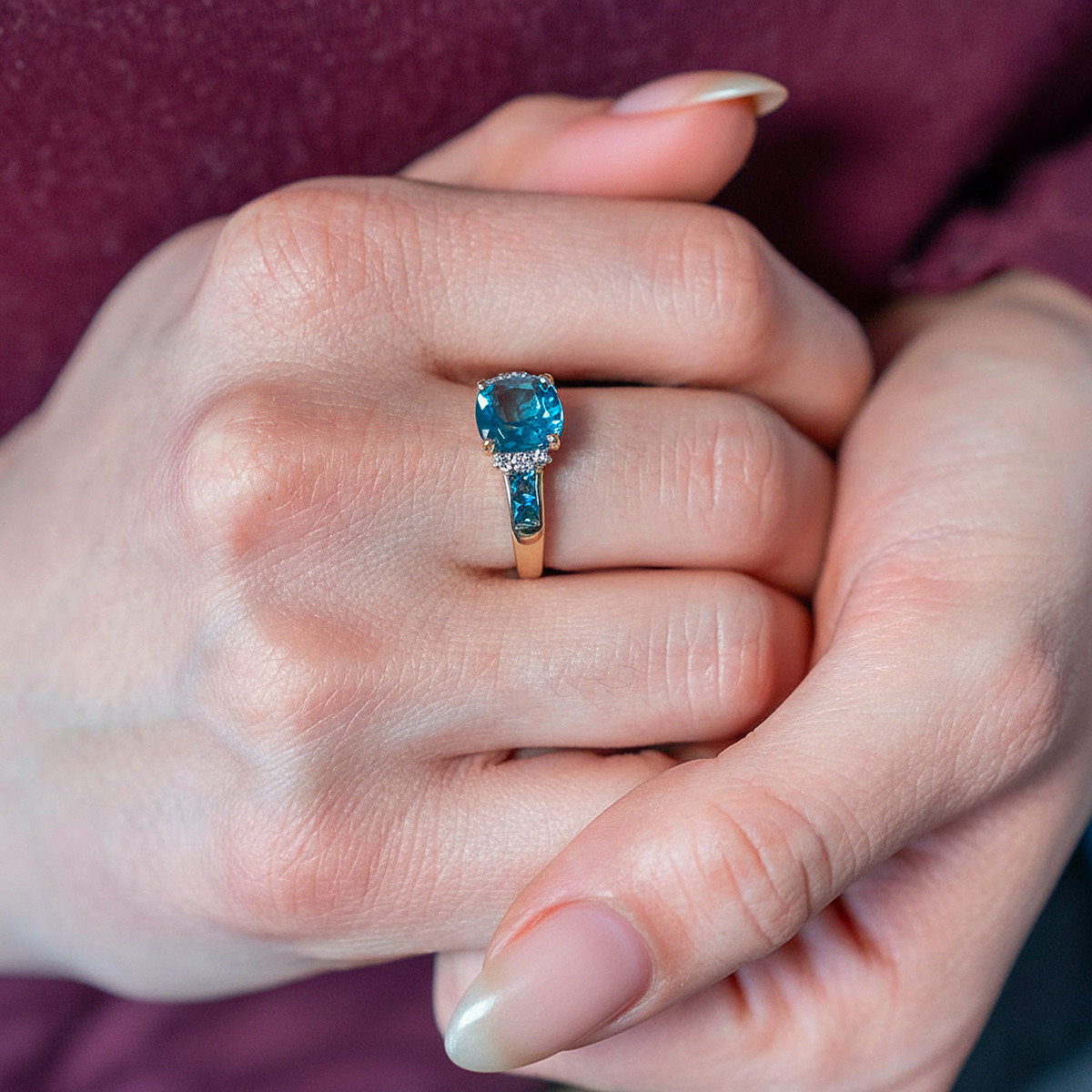 375 Gold Two-Tone Ring with Treated Blue Topaz and Diamonds - Worn View 1
