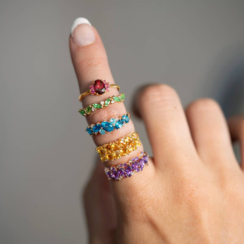 375 geelgouden ring met ovale blauwe topazen en diamanten