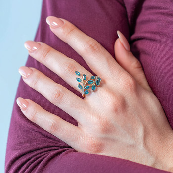 Bague or 375 jaune diamants et topazes bleues traitées