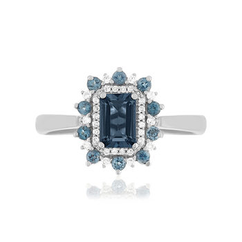 Bague or 375 blanc topazes bleues traitées et diamants