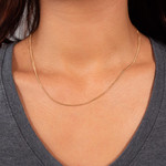 Chaîne or 750 jaune maille gourmette 45 cm - vue porté 1