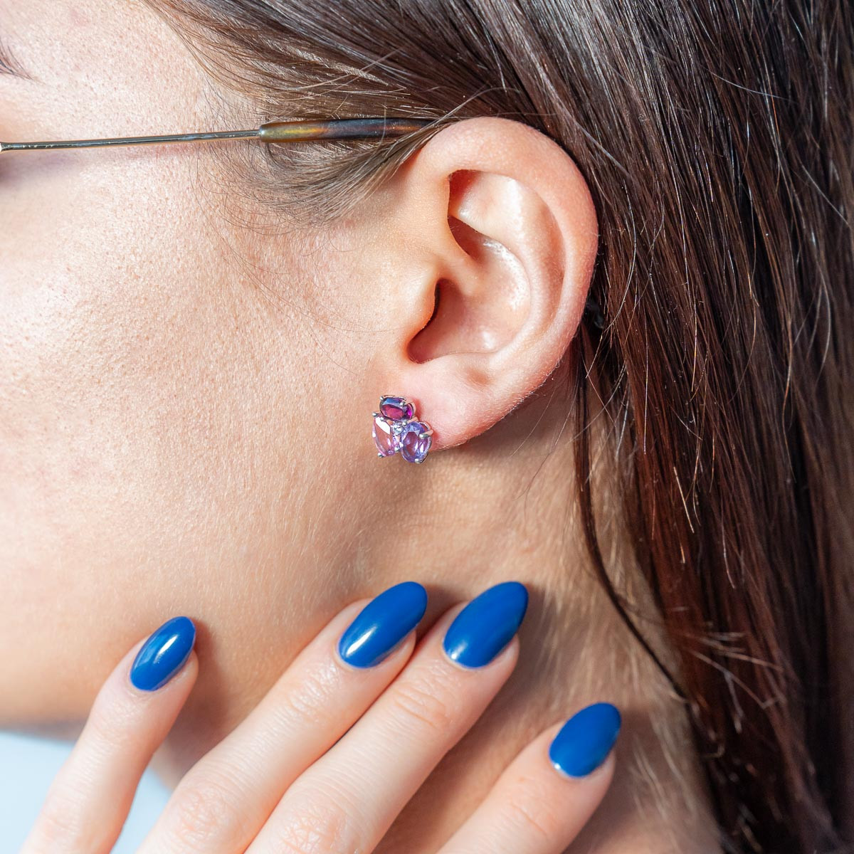 750 white gold earrings with rhodolite garnets, amethysts, treated topazes, and zirconia stones - worn view 1