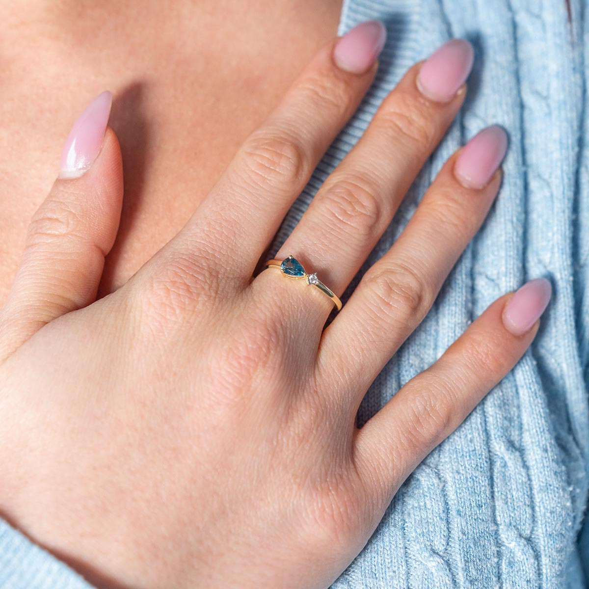 750 yellow gold ring with diamonds and treated London Blue topaz - worn view 1