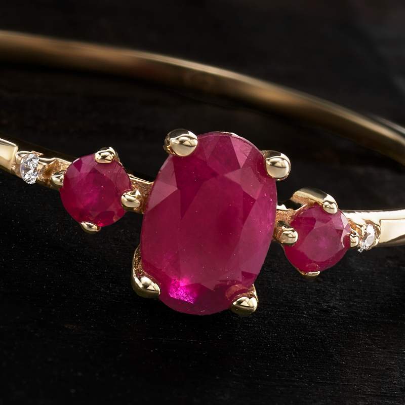 Bague or 375 jaune rubis et diamants - vue D1