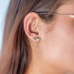 925 sterling silver earrings with cultured pearls from China, peridots, and treated white topazes - worn view 1