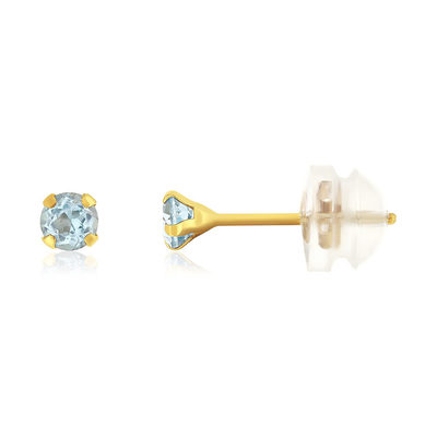 Boucles d'oreilles or 375 jaune topazes bleues traitées 0.24 carat