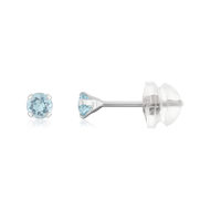 Boucles d'oreilles or 375 blanc topaze bleues traitées 0.29 carat