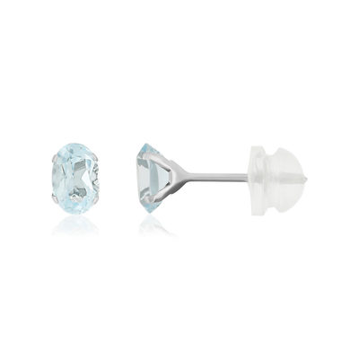 Boucles d'oreilles or 375 blanc topazes bleues traitées 1.14 carat