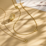 Collier plaqué or jaune boucles ajourées et zirconias - vue D1