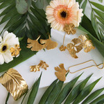 Boucles d'oreilles acier jaune motifs fleurs - vue D1