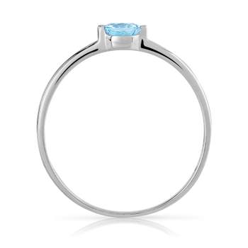 375 white gold ring with treated blue topaz