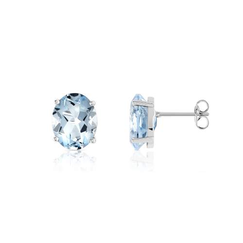 Boucles d'oreilles or 375 blanc topazes bleues traitées