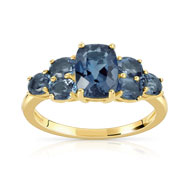 Bague or 375 jaune topaze bleue traitee