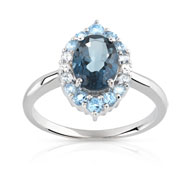 Bague or 375 blanc topaze bleue traitée et diamant