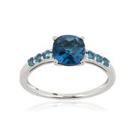 Bague or 375 blanc topaze bleue traitée