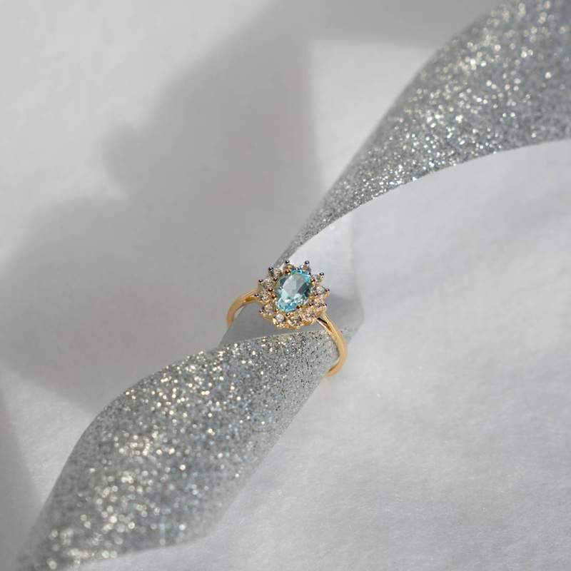 Bague or 375 2 tons fleur topaze bleue traitée ovale et zirconias - vue D1