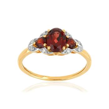 2-tone garnet and diamond ring in 375 gold