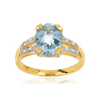 375 gold ring with oval-cut topaz and diamonds