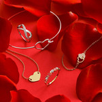 Bague or 750 2 tons coeurs rubis et diamants - vue D1