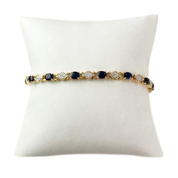 Armband van 750 goud in twee tinten, met saffier en diamant