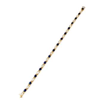 Armband van 750 goud in twee tinten, met saffier en diamant