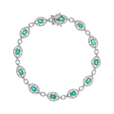 Bracelet or 750 blanc emeraudes et diamants