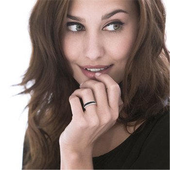 750 white gold ring with treated black diamonds