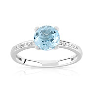 Bague or 375 blanc topaze bleue traitée et diamant