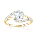 Bague or 375 2 tons ajourée topaze bleue traitée ovale et diamants - vue 1