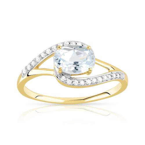 Bague or 375 2 tons ajourée topaze bleue traitée ovale et diamants